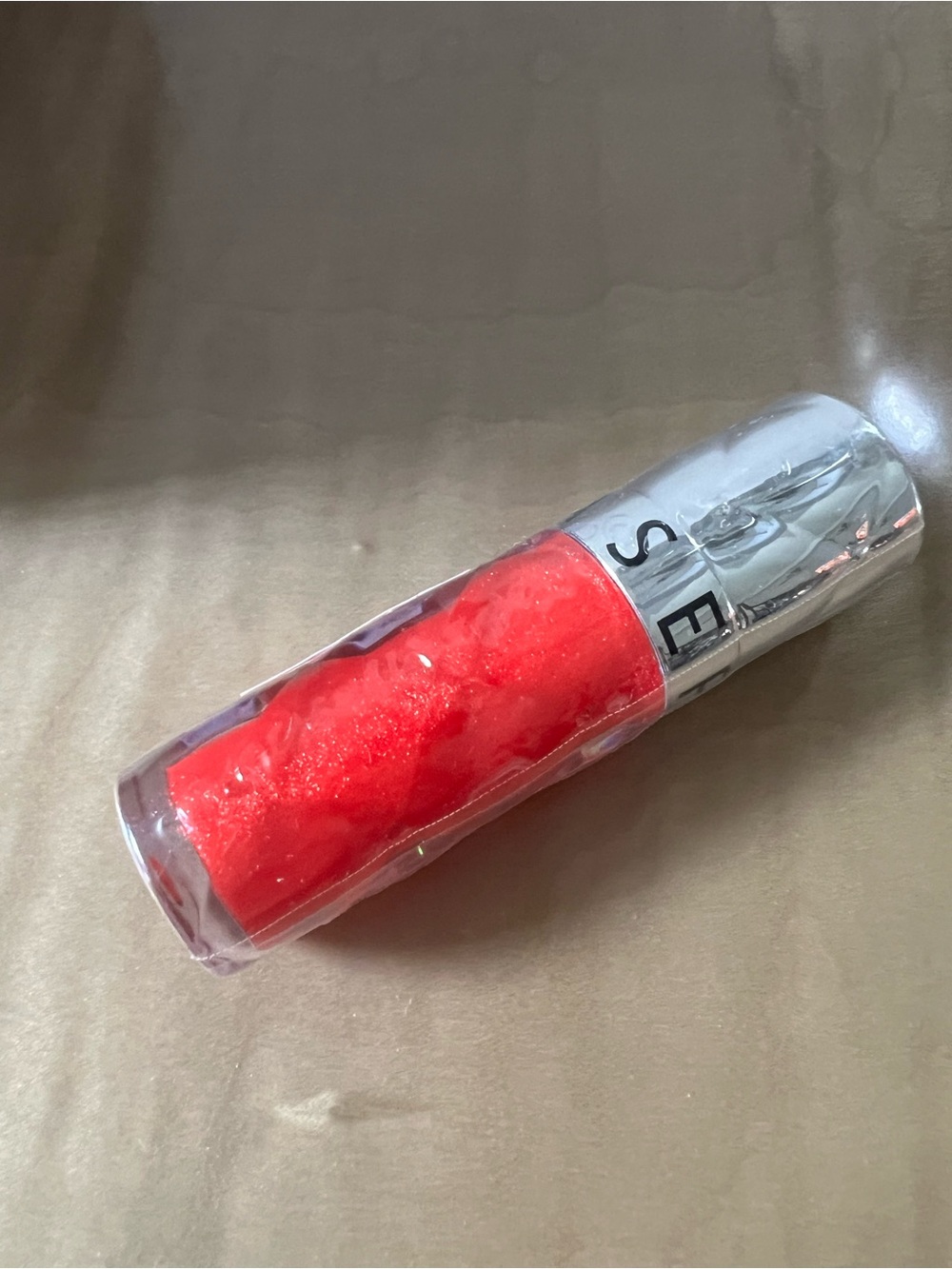 Sephora Coral Orange High-Shine Lip Gloss. Outrageous Effet Volume 10